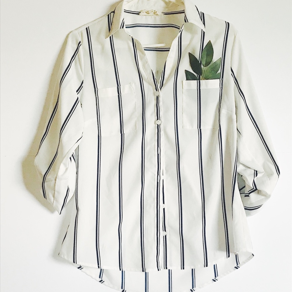 White button down blouse with dark blue stripes.